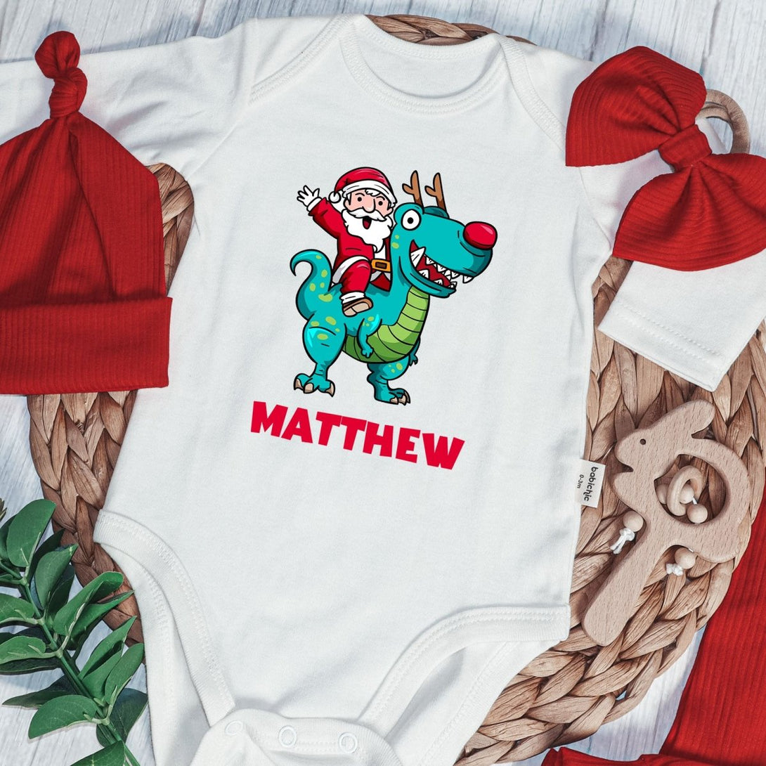 Personalized Santa Riding Dinosaur Baby Boy Onesie and Long Pants Set | Custom Christmas T-Rex Baby Bodysuit - BabiChic