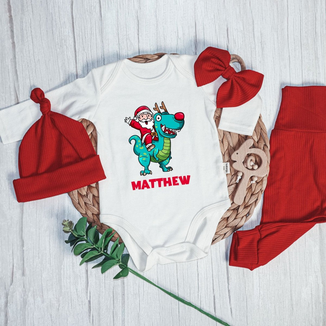 Personalized Santa Riding Dinosaur Baby Boy Onesie and Long Pants Set | Custom Christmas T-Rex Baby Bodysuit - BabiChic