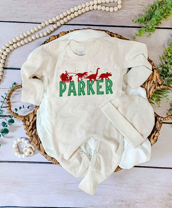 Pesonalized Christmas Neutral Baby Romper with Bow or Hat | Oatmeal Romper Santa Sleigh Dinosaur Christmas Baby Name | Infant Christmas Outfit - BabiChic