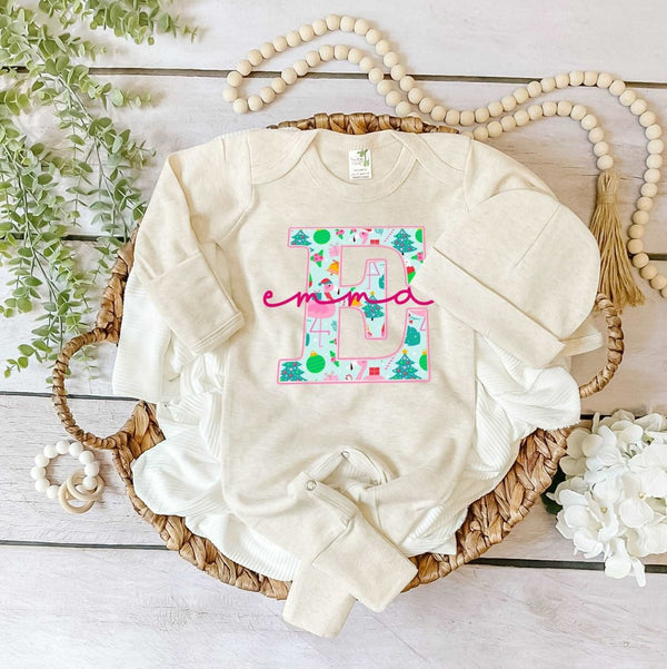 Pesonalized Christmas Neutral Baby Romper with Bow or Hat | Oatmeal Romper with Blue and Pink Flamingos Christmas Print Initial Baby Name | Newborn Xmas Outfit - BabiChic