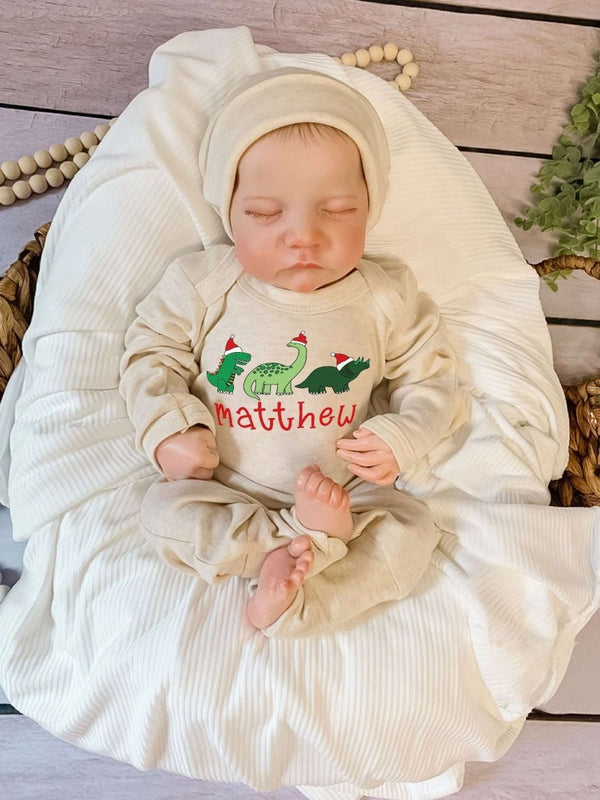 Pesonalized Christmas Neutral Infant Romper with Bow or Hat | Oatmeal Romper 1st Christmas Dinosaur Baby Name | Xmas Newborn Outfit - BabiChic